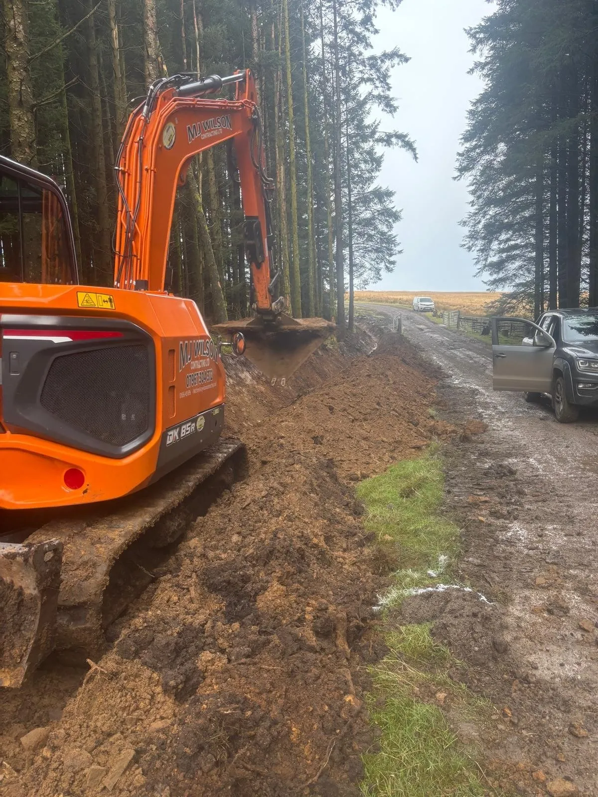 Excavator at work on a forestry track