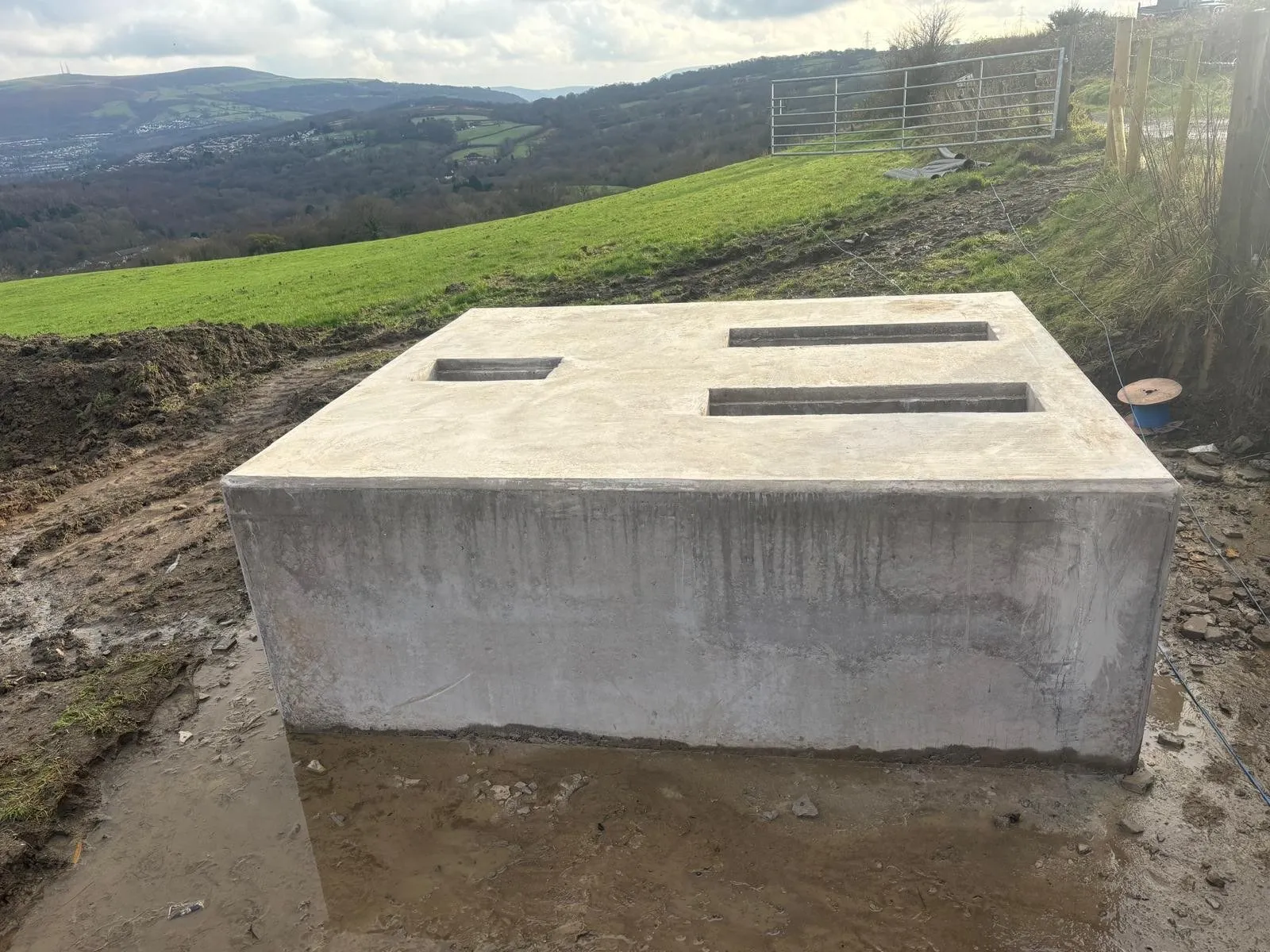 Finished concrete base in open ground