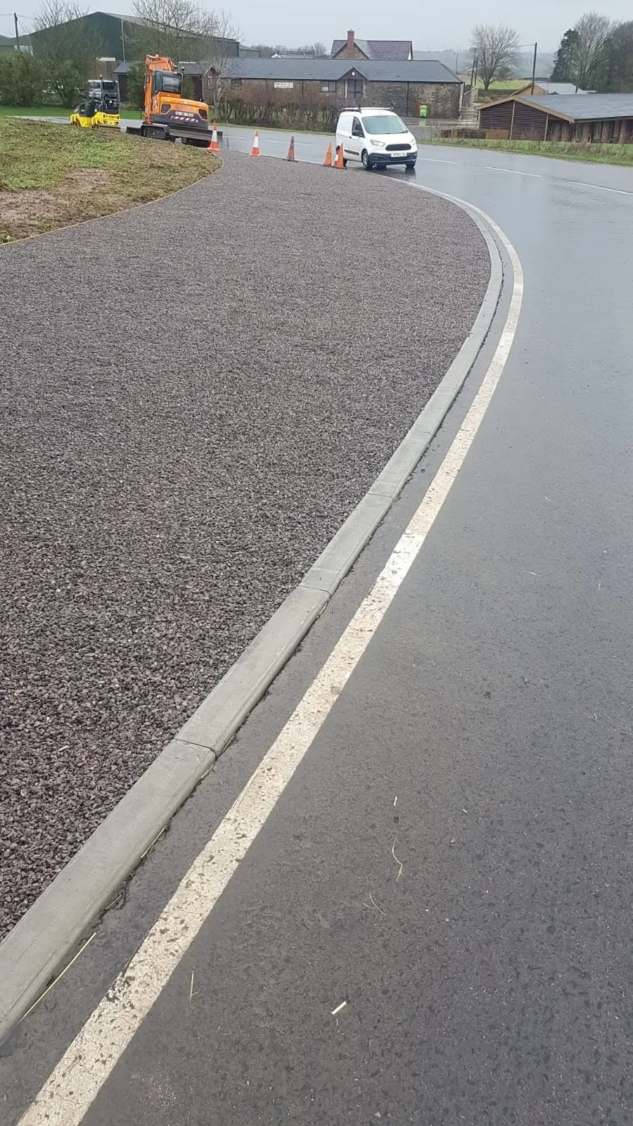 Completed kerbed verge following the curve of the road