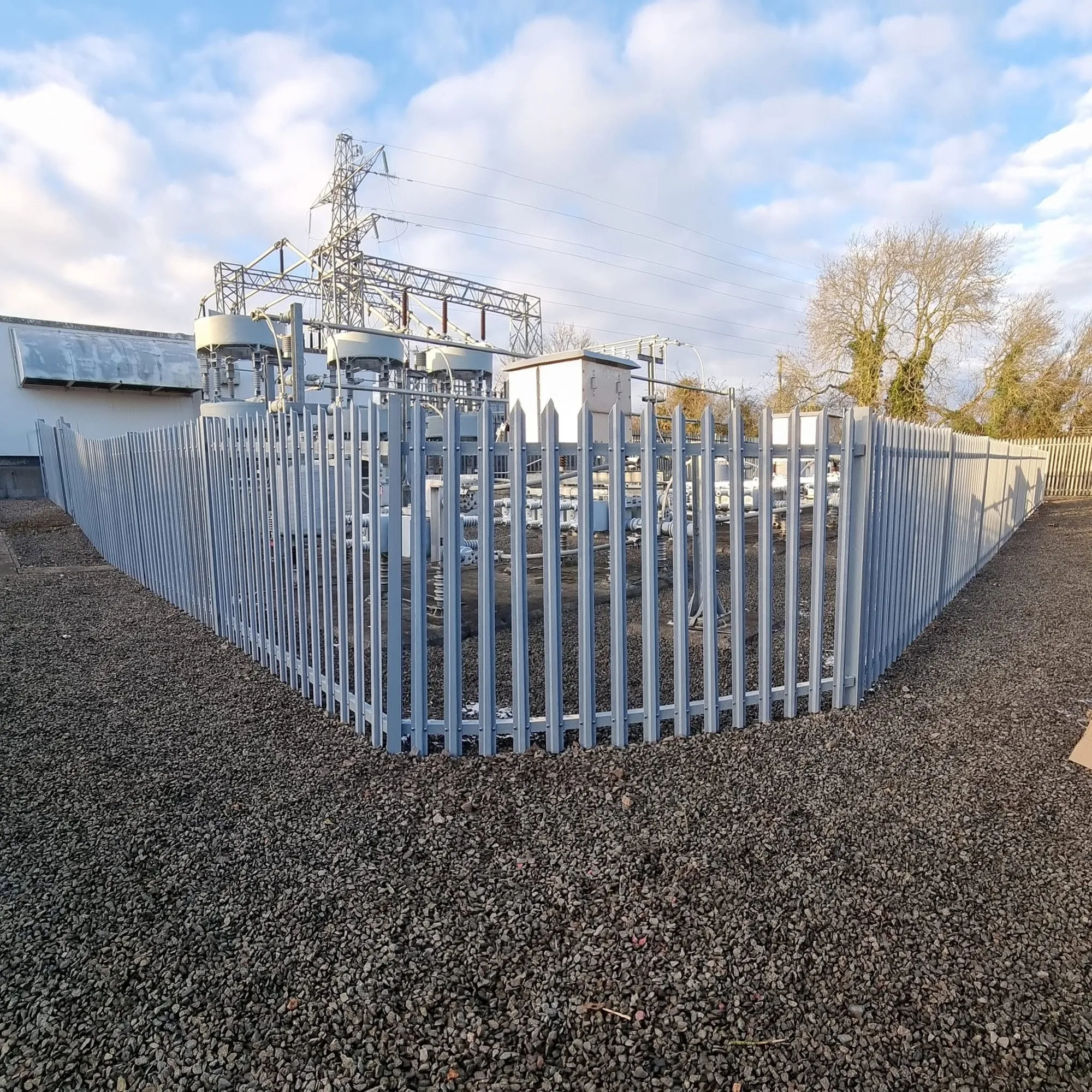 Palisade fence turning a corner around the substation compound