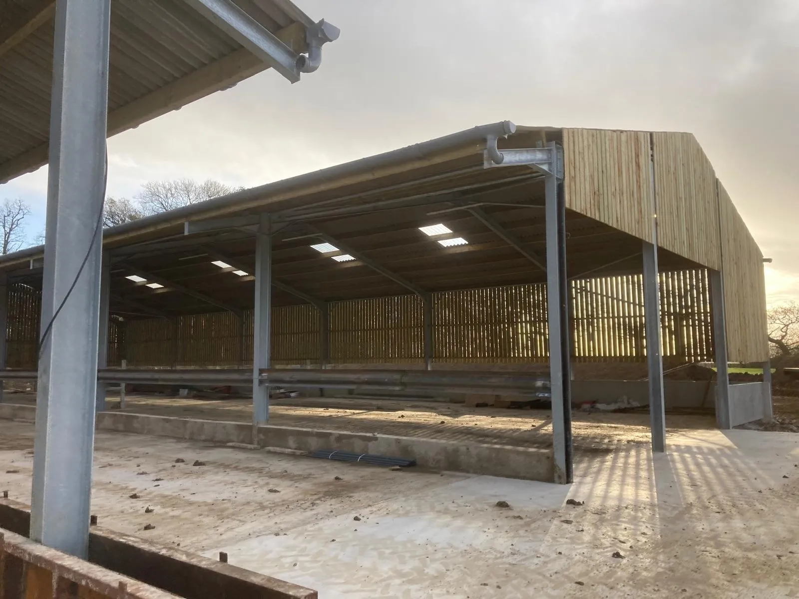 Concrete floor laid inside a steel-framed building